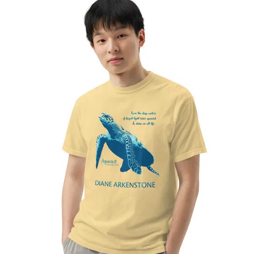 Man wearing Aquaria II tshirt